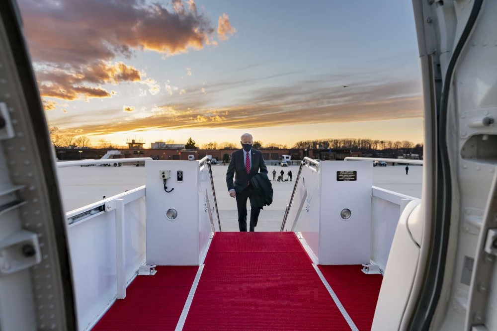President Joe Biden boards Air Force One at Joint Base Andrews, Maryland Friday, Feb. 5, 2021, en route to New Castle County Airport in New Castle, Delaware.