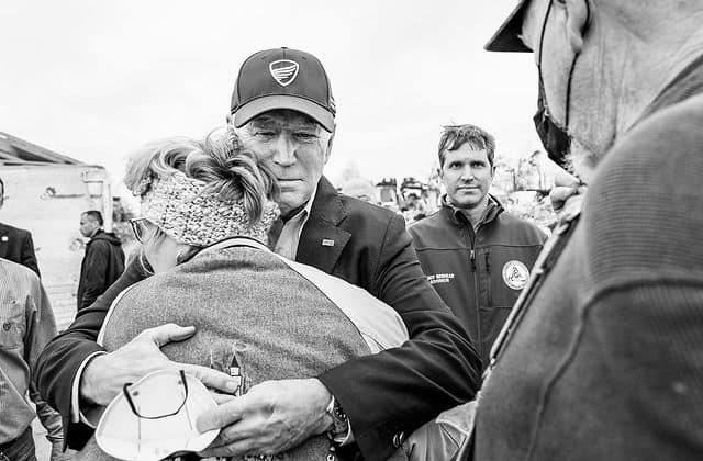 President Joe Biden comforts a member of Kentucky community during tour of tornado damage on Wednesday, December 15, 2021.