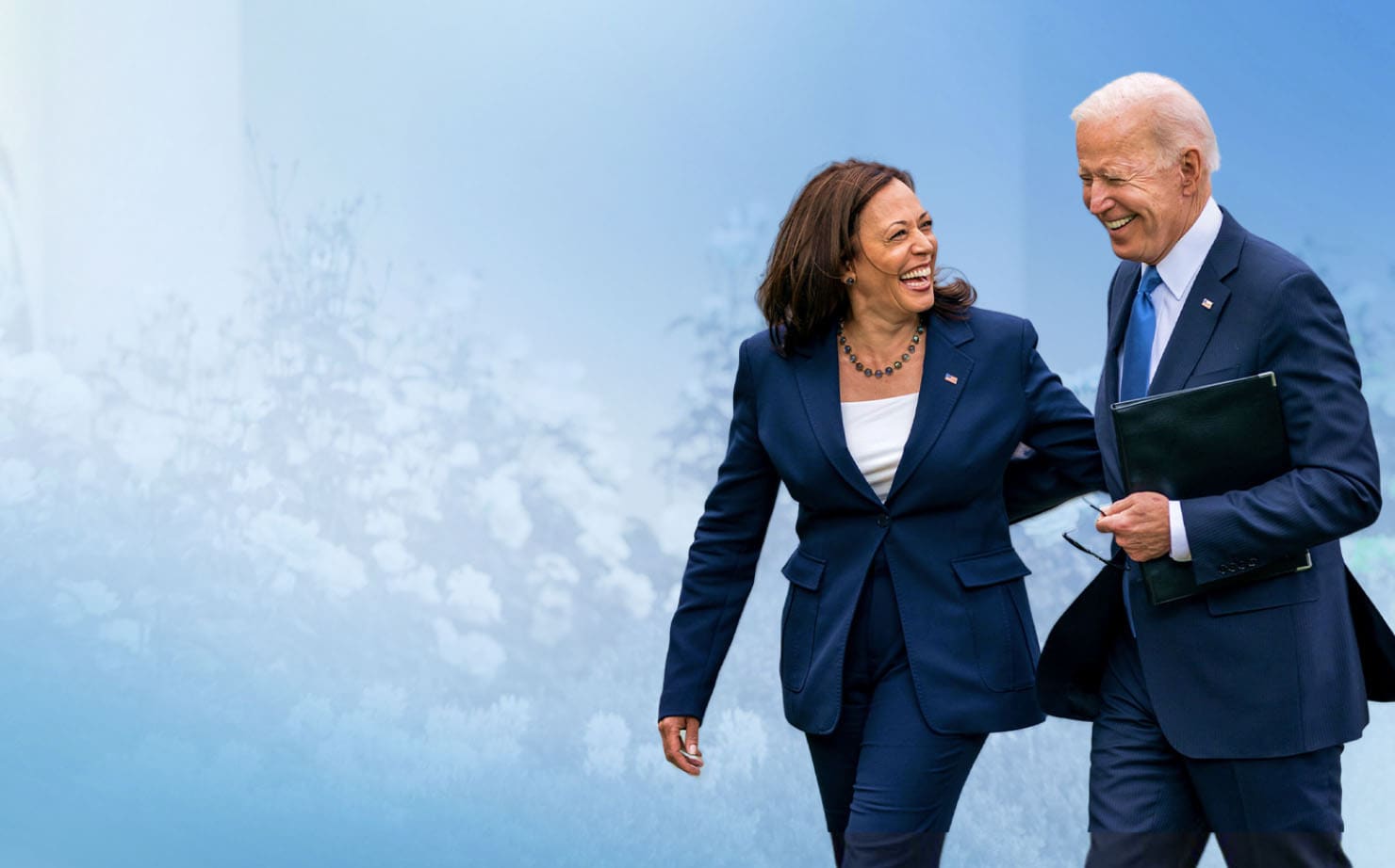 President Biden and Vice President Harris walking and talking
