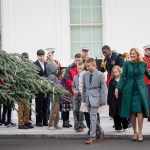 First Lady Jill Biden arrives to the North Portico with a group of children from military families for the arrival of the White House Christmas tree
