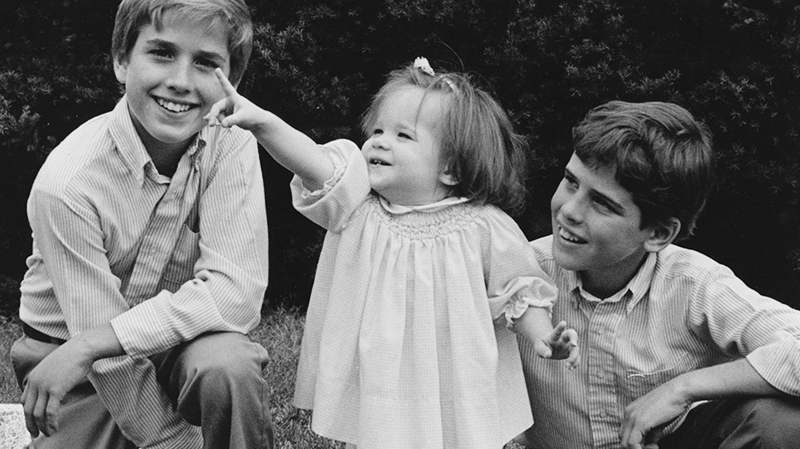 Beau, Ashley, and Hunter Biden posing next to each other as young children in a black-and-white photo.