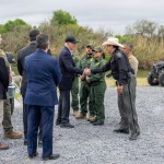 President Joe Biden greets agents at a Border Patrol boat and receives a briefing about operations on the Rio Grande
