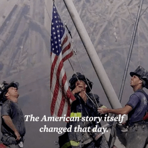 Three firefighters raising the American flag in the rubble after the 9/11 attack