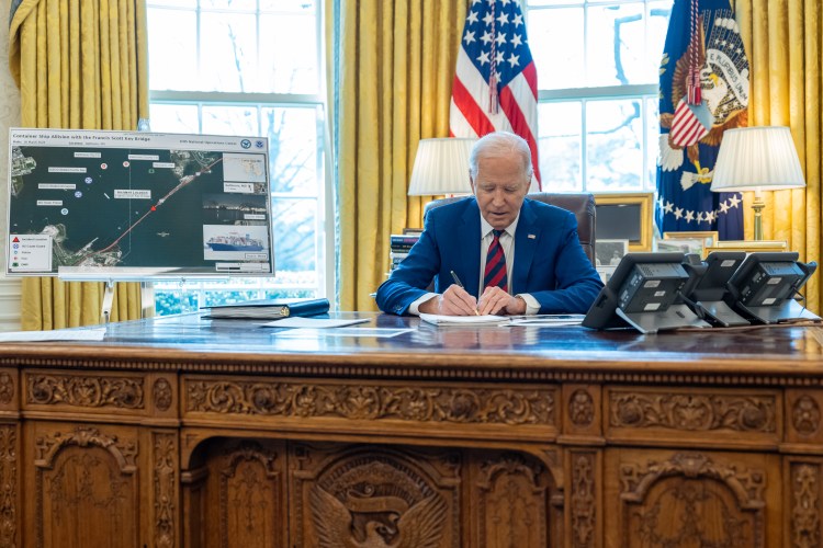 President Joe Biden is briefed on the overnight collapse of the Francis Scott Key Bridge in Baltimore, Tuesday, March 26, 2024, in the Oval Office