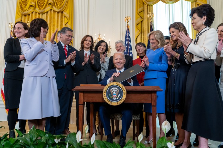 President Joe Biden signs an Executive Order on Advancing Women’s health Research and Innovation