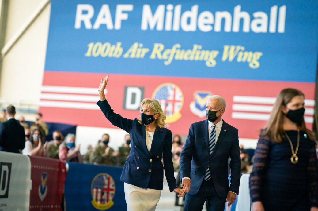 President Joe Biden and First Lady Jill Biden wave to service members