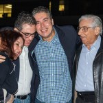 4 people smiling and embracing after the release of Americans imprisoned in Iran