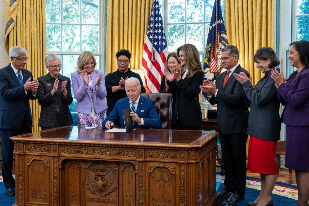 President Joe Biden, joined by First Lady Jill Biden, signs the Presidential Memorandum on Women’s Health Research