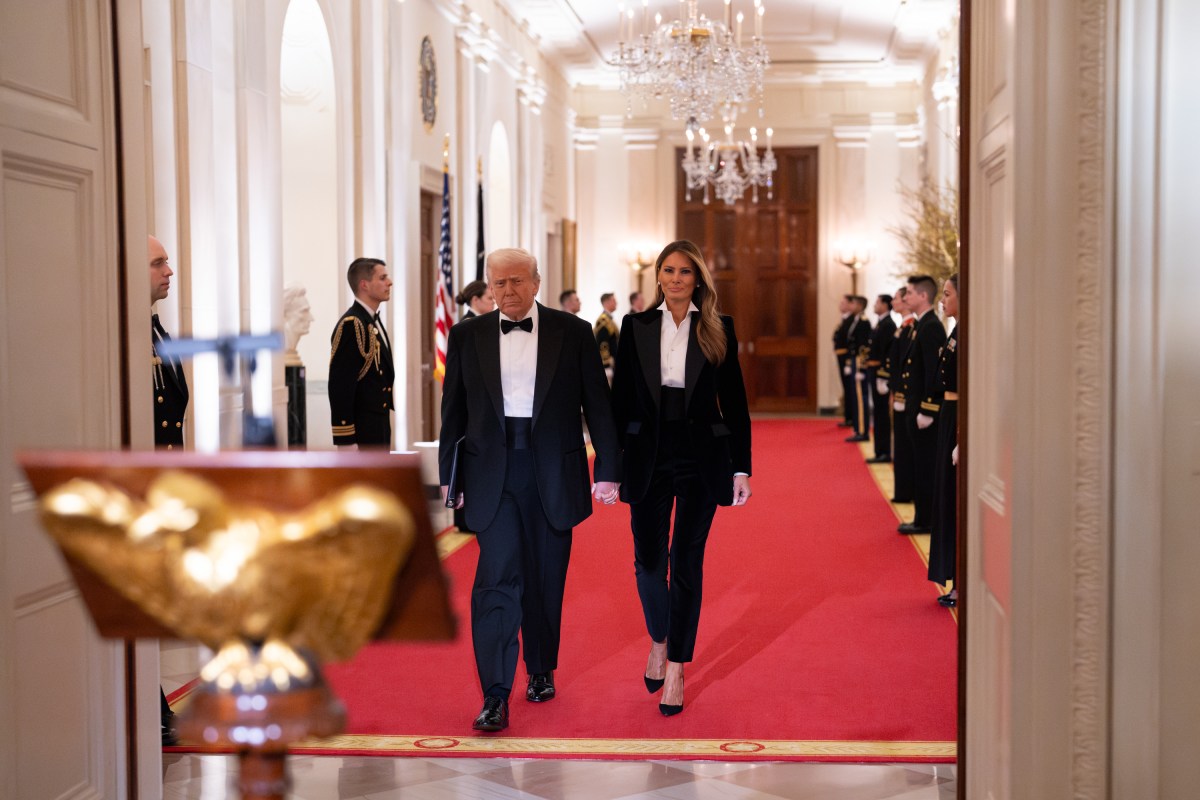 President Donald J. Trump and First Lady Melania Trump walk down the cross hall of the White House during the governor’s ball, Saturday, February 22, 2025.  (Official White House Photo by Andrea Hanks)
