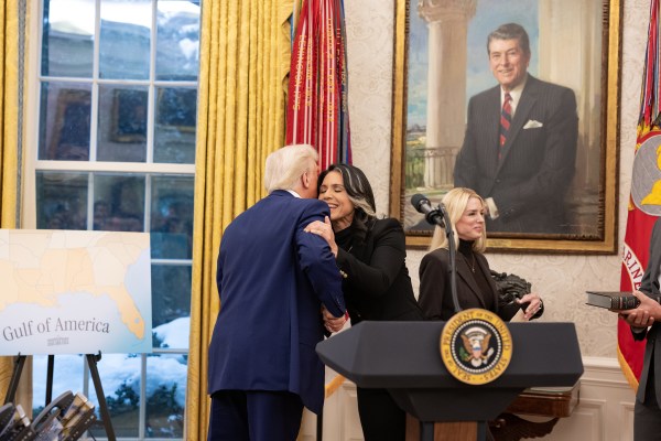 President Donald J. Trump congratulates Tulsi Gabbard after she is sworn in as Director of National Intelligence by Attorney General Pam Bondi in the Oval Office, Wednesday, February 12, 2025. (Official White House Photo by Molly Riley.)