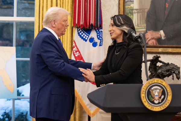 President Donald J. Trump congratulates Tulsi Gabbard after she is sworn in as Director of National Intelligence by Attorney General Pam Bondi in the Oval Office, Wednesday, February 12, 2025. (Official White House Photo by Molly Riley.)