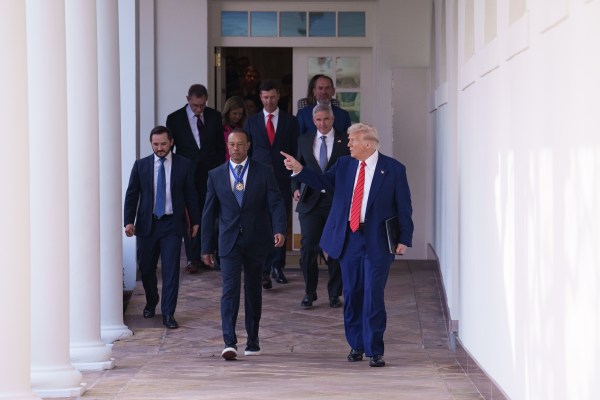 President Donald J. Trump walks from the Oval Office with Tiger Woods along the West Colonnade, before a reception honoring Black History Month, Thursday, February 20, 2025, at the White House. (Official White House Photo by Joyce Boghosian)