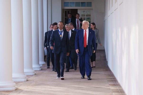 President Donald J. Trump walks from the Oval Office with Tiger Woods along the West Colonnade, before a reception honoring Black History Month, Thursday, February 20, 2025, at the White House. (Official White House Photo by Joyce Boghosian)