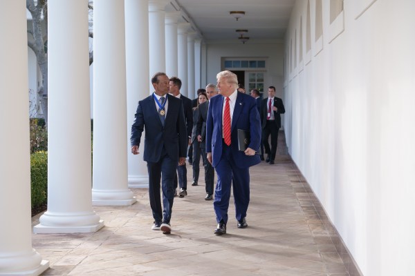 President Donald J. Trump walks from the Oval Office with Tiger Woods along the West Colonnade, before a reception honoring Black History Month, Thursday, February 20, 2025, at the White House. (Official White House Photo by Joyce Boghosian)