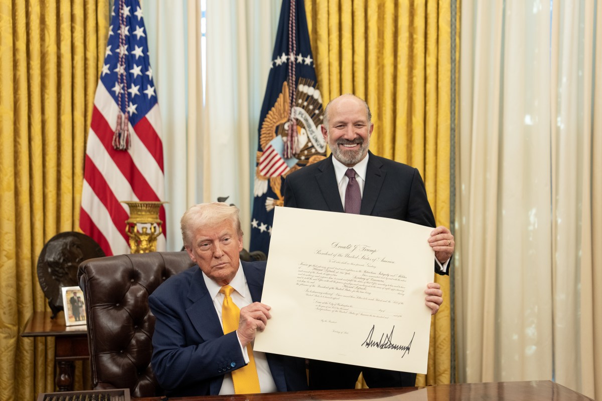 President Donald Trump makes remarks at the swearing-in of Commerce Secretary Howard Lutnick, Friday, February 21, 2025, in the Oval Office.

Commerce Secretary Howard Lutnick is sworn in Friday, February 21, 2025, in the Oval Office.
(Official White House Photo by Joyce N. Boghosian)