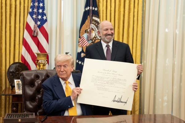 President Donald Trump makes remarks at the swearing-in of Commerce Secretary Howard Lutnick, Friday, February 21, 2025, in the Oval Office.

Commerce Secretary Howard Lutnick is sworn in Friday, February 21, 2025, in the Oval Office.
(Official White House Photo by Joyce N. Boghosian)