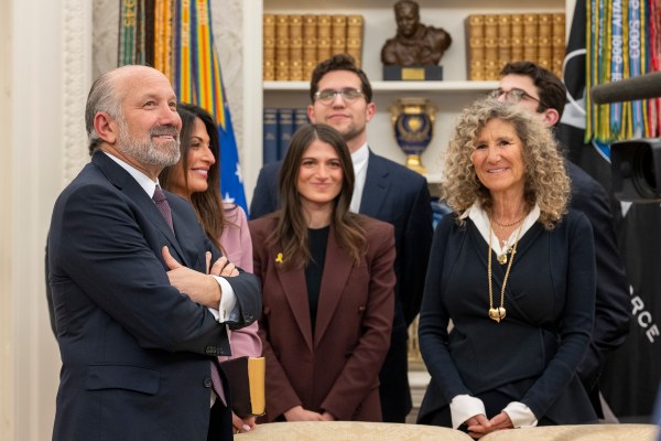 President Donald Trump makes remarks at the swearing-in of Commerce Secretary Howard Lutnick, Friday, February 21, 2025, in the Oval Office.(Official White House Photo by Molly Riley)
