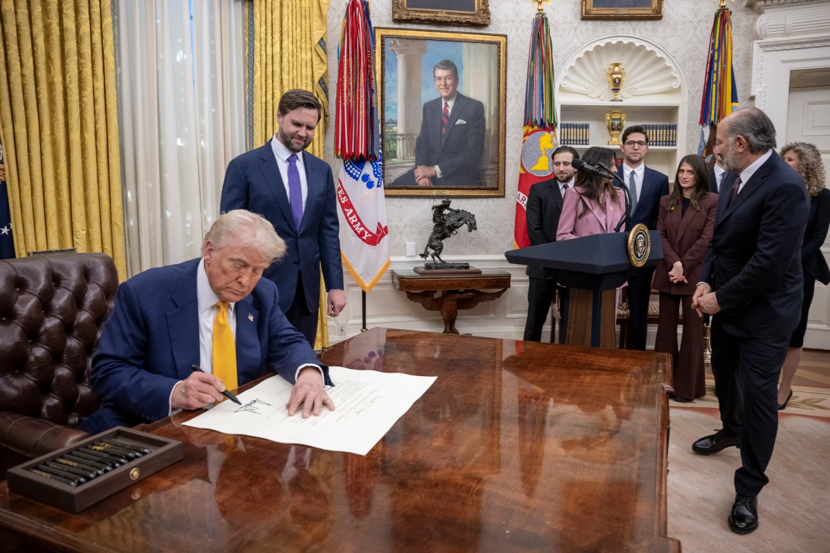 President Donald Trump makes remarks at the swearing-in of Commerce Secretary Howard Lutnick, Friday, February 21, 2025, in the Oval Office.(Official White House Photo by Molly Riley)