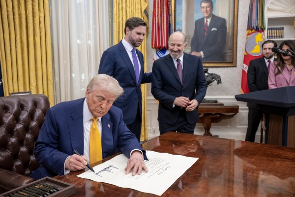 President Donald Trump makes remarks at the swearing-in of Commerce Secretary Howard Lutnick, Friday, February 21, 2025, in the Oval Office.(Official White House Photo by Molly Riley)