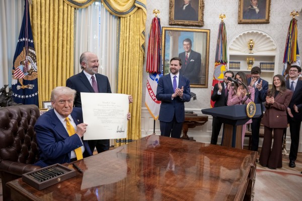 President Donald Trump makes remarks at the swearing-in of Commerce Secretary Howard Lutnick, Friday, February 21, 2025, in the Oval Office.(Official White House Photo by Molly Riley)