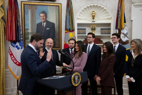 President Donald Trump makes remarks at the swearing-in of Commerce Secretary Howard Lutnick, Friday, February 21, 2025, in the Oval Office.(Official White House Photo by Molly Riley)