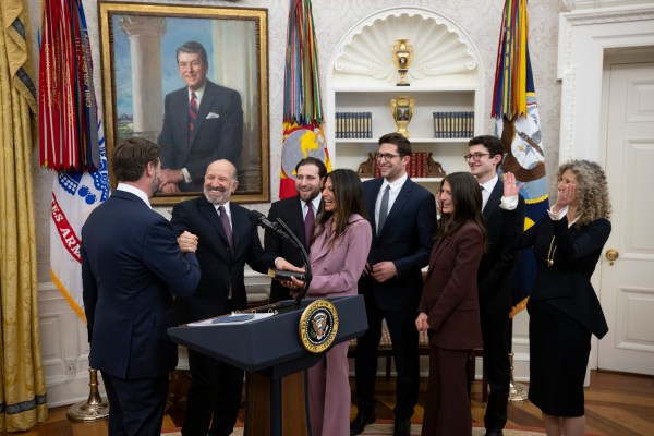 President Donald Trump makes remarks at the swearing-in of Commerce Secretary Howard Lutnick, Friday, February 21, 2025, in the Oval Office.(Official White House Photo by Molly Riley)