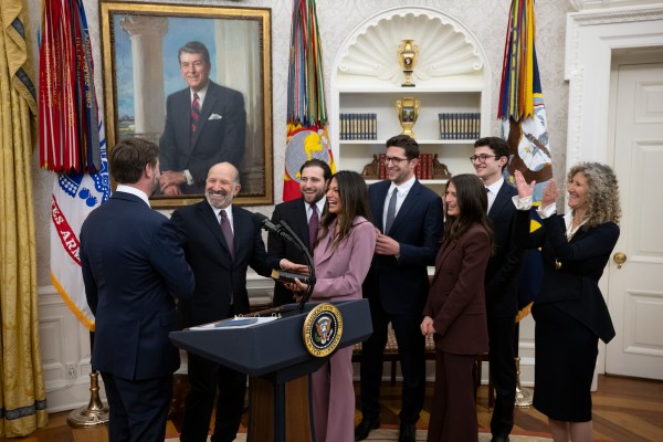 President Donald Trump makes remarks at the swearing-in of Commerce Secretary Howard Lutnick, Friday, February 21, 2025, in the Oval Office.(Official White House Photo by Molly Riley)