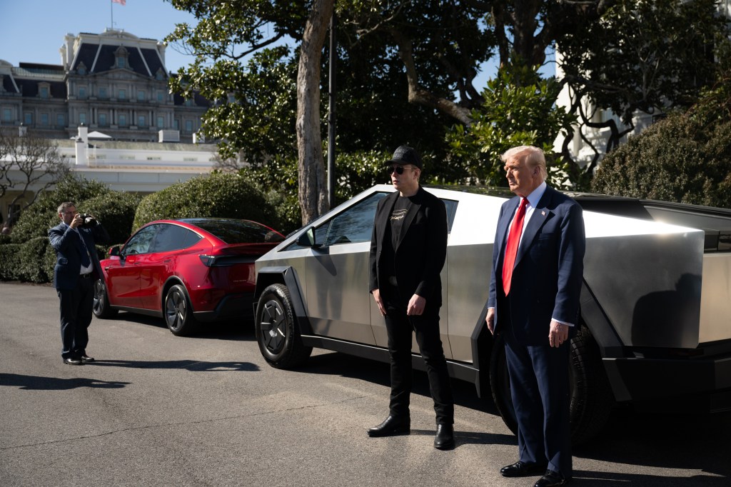 President Donald J. Trump purchases a Tesla on the South Lawn, Tuesday, March 11, 2025. (Official White House Photo by Molly Riley)