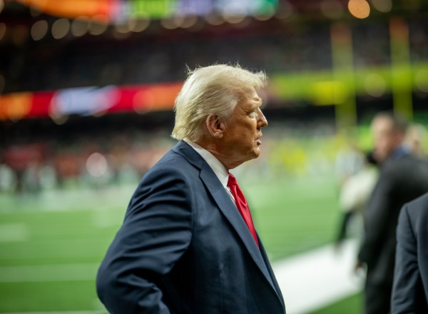 President Donald Trump greets honorary coin toss participants, including family members of the victims from the New Years terrorist attack, members of the New Orleans Police Department and emergency personnel at Caesars Superdome in New Orleans, Louisiana, Sunday, February 9, 2025, before the start of Superbowl LIX between the Philadelphia Eagles and the Kansas City Chiefs. (Official White House photo by Daniel Torok)