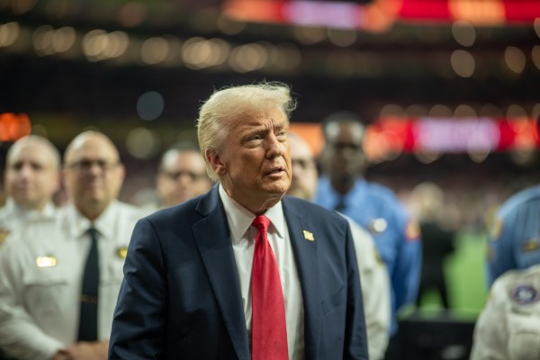 President Donald Trump greets honorary coin toss participants, including family members of the victims from the New Years terrorist attack, members of the New Orleans Police Department and emergency personnel at Caesars Superdome in New Orleans, Louisiana, Sunday, February 9, 2025, before the start of Superbowl LIX between the Philadelphia Eagles and the Kansas City Chiefs. (Official White House photo by Daniel Torok)