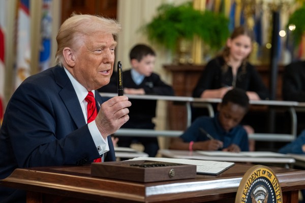 President Donald Trump signs an Executive Order to dismantle the Department of Education, Thursday, March 20, 2025, in the East Room of the White House. (Official White House Photo by Daniel Torok)