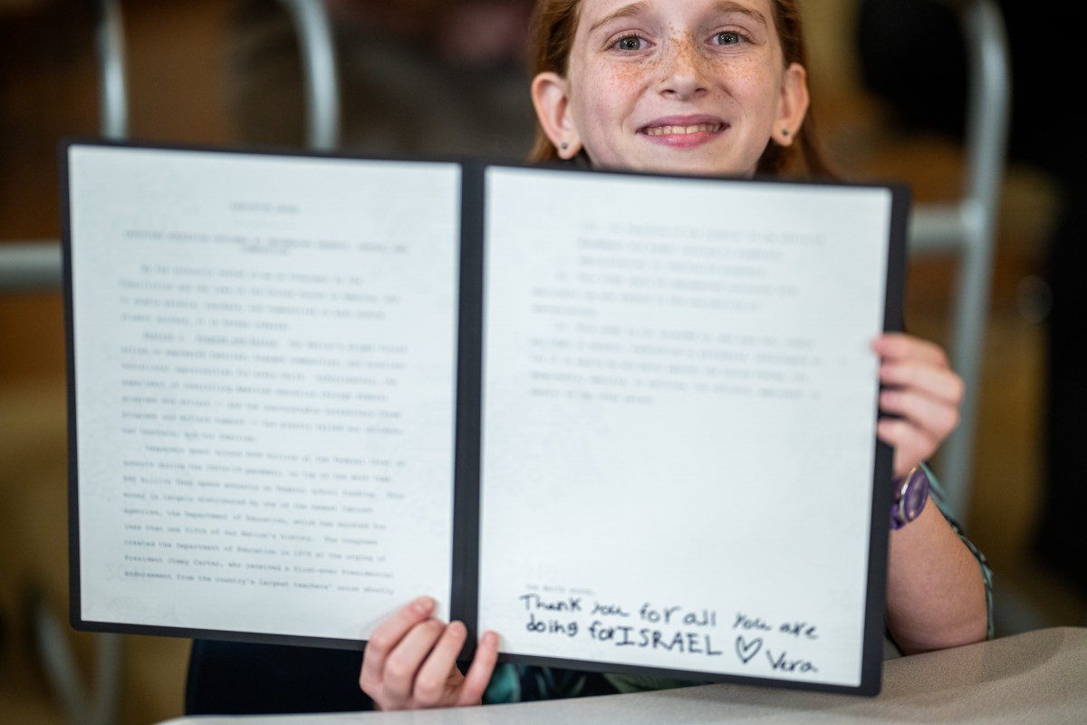 President Donald Trump signs an Executive Order to dismantle the Department of Education, Thursday, March 20, 2025, in the East Room of the White House. (Official White House Photo by Daniel Torok)