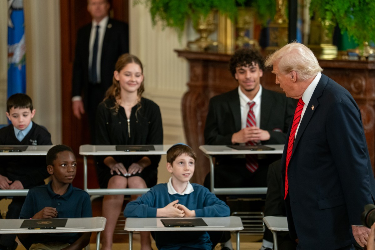President Donald Trump signs an Executive Order to dismantle the Department of Education, Thursday, March 20, 2025, in the East Room of the White House. (Official White House Photo by Joyce N. Boghosian)