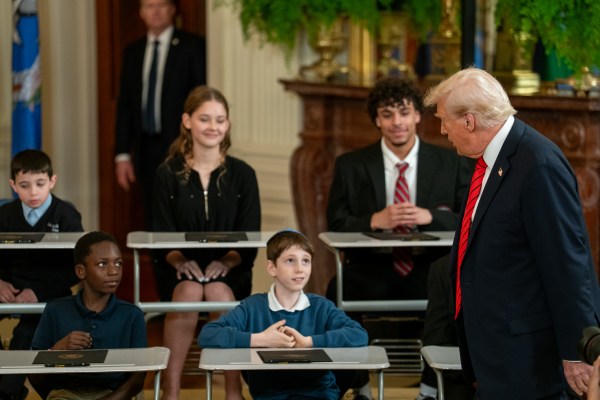 President Donald Trump signs an Executive Order to dismantle the Department of Education, Thursday, March 20, 2025, in the East Room of the White House. (Official White House Photo by Joyce N. Boghosian)