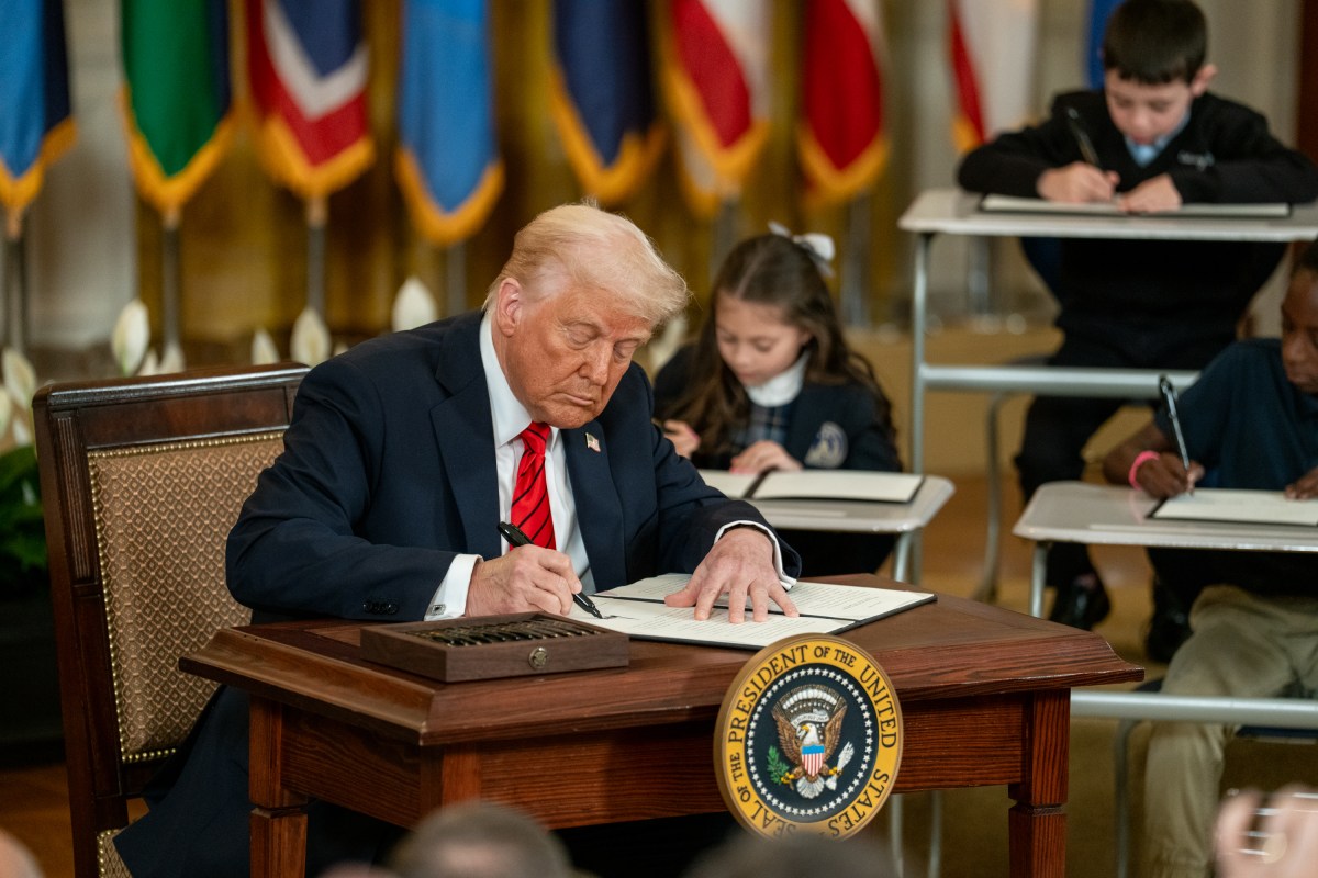 President Donald Trump signs an Executive Order to dismantle the Department of Education, Thursday, March 20, 2025, in the East Room of the White House. (Official White House Photo by Joyce N. Boghosian)