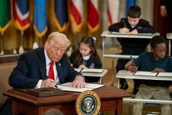 President Donald Trump signs an Executive Order to dismantle the Department of Education, Thursday, March 20, 2025, in the East Room of the White House. (Official White House Photo by Joyce N. Boghosian)