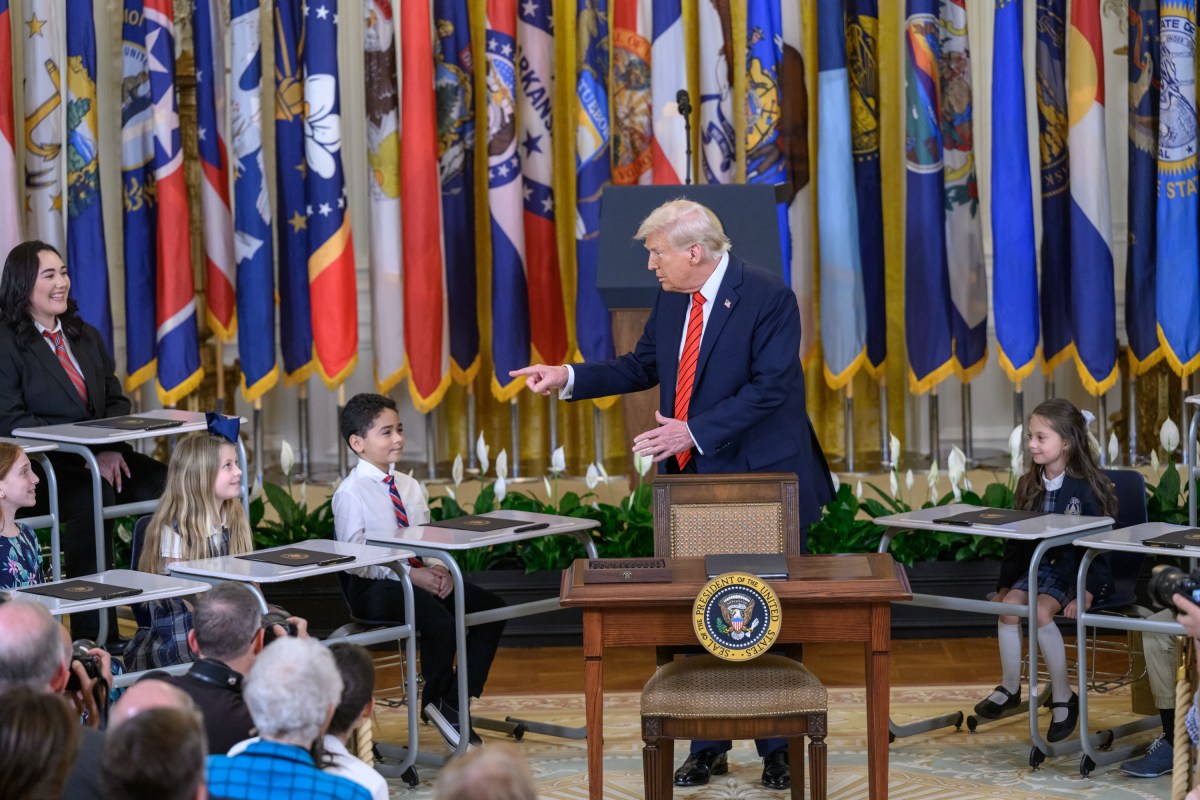 President Donald Trump signs an Executive Order to dismantle the Department of Education, Thursday, March 20, 2025, in the East Room of the White House. (Official White House Photo by Molly Riley)