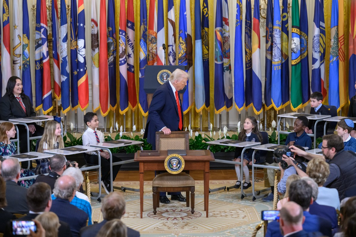President Donald Trump signs an Executive Order to dismantle the Department of Education, Thursday, March 20, 2025, in the East Room of the White House. (Official White House Photo by Molly Riley)