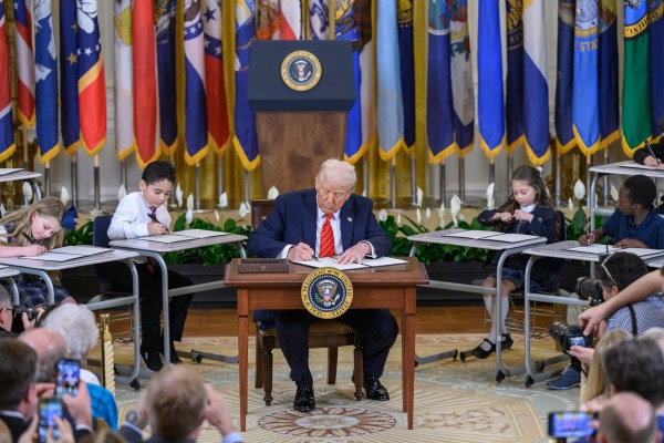 President Donald Trump signs an Executive Order to dismantle the Department of Education, Thursday, March 20, 2025, in the East Room of the White House. (Official White House Photo by Molly Riley)