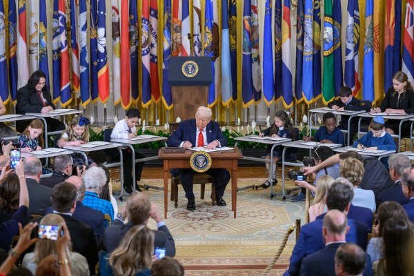 President Donald Trump signs an Executive Order to dismantle the Department of Education, Thursday, March 20, 2025, in the East Room of the White House. (Official White House Photo by Molly Riley)