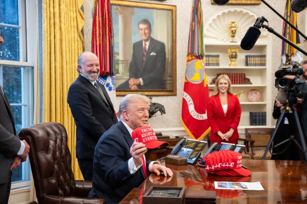 President Donald Trump signs executive orders in the Oval Office, Tuesday, February 25, 2025. (Official White House Photo by Molly Riley)