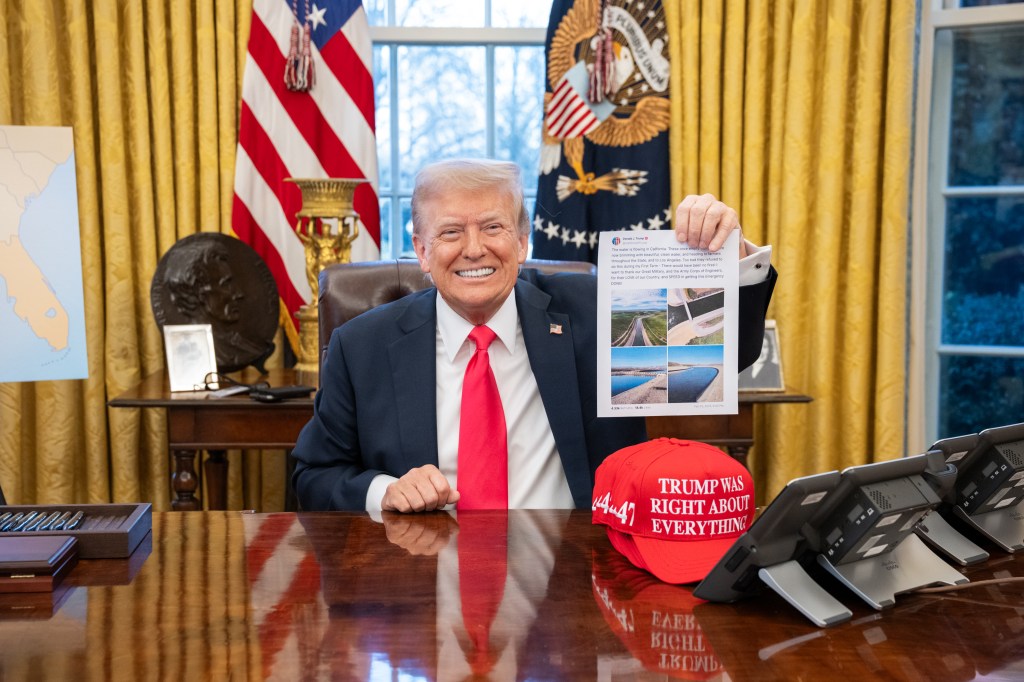 President Donald Trump signs executive orders in the Oval Office, Tuesday, February 25, 2025. (Official White House Photo by Molly Riley)