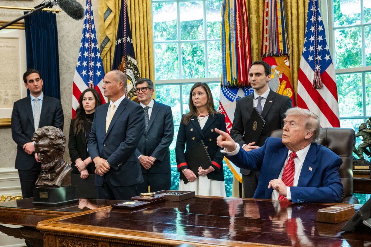 President Donald Trump signs executive orders regarding nuclear energy, Friday, May 23, 2025, in the Oval Office. (Official White House Photo by Molly Riley)