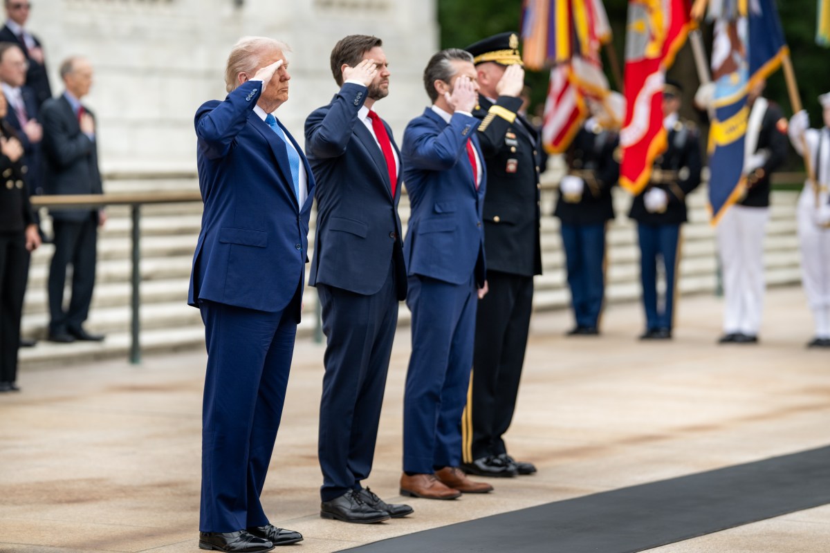 President Donald Trump greets Vice President JD Vance, Defense Secretary Pete Hegseth, Chairman of the Joint Chiefs General Dan Caine, Executive Director of the Office of Army National Military Cemeteries Karen Durham-Aguilera, commanding general of the Joint Task Force-National Capital Region and the US Army Military District of Washington Major General Trevor J. Bredenkamp and LTG Michele Bredenkamp at Arlington National Cemetery, Monday, May 26, 2025, in Arlington, Virginia. (Official White House Photo by Daniel Torok)