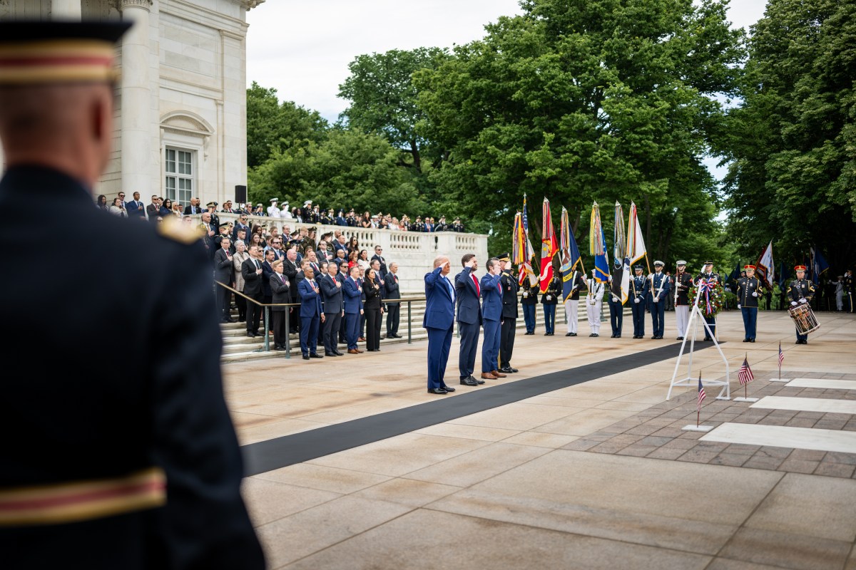 President Donald Trump greets Vice President JD Vance, Defense Secretary Pete Hegseth, Chairman of the Joint Chiefs General Dan Caine, Executive Director of the Office of Army National Military Cemeteries Karen Durham-Aguilera, commanding general of the Joint Task Force-National Capital Region and the US Army Military District of Washington Major General Trevor J. Bredenkamp and LTG Michele Bredenkamp at Arlington National Cemetery, Monday, May 26, 2025, in Arlington, Virginia. (Official White House Photo by Daniel Torok)