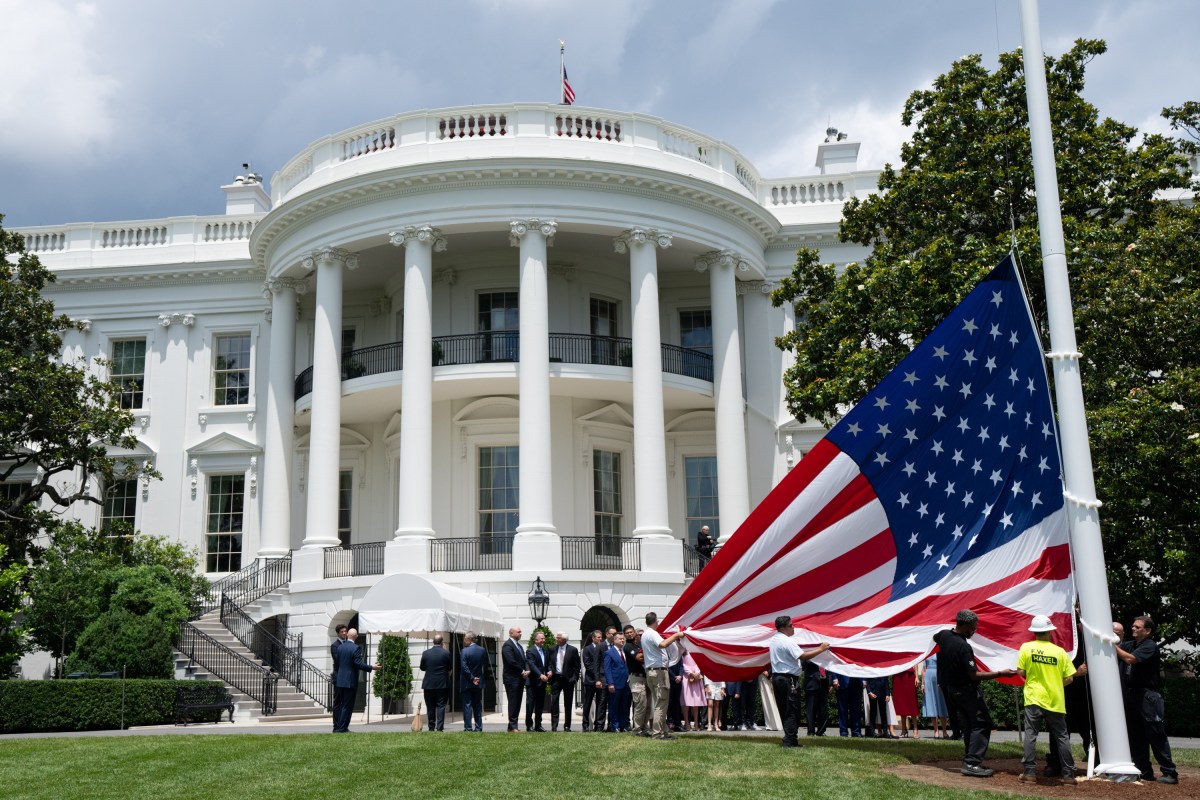 President Donald Trump watches the United States flag is raised on the newly installed flagpole on the South Lawn of the White House, Wednesday, June 18, 2025. (Official White House Photo by Andrea Hanks)