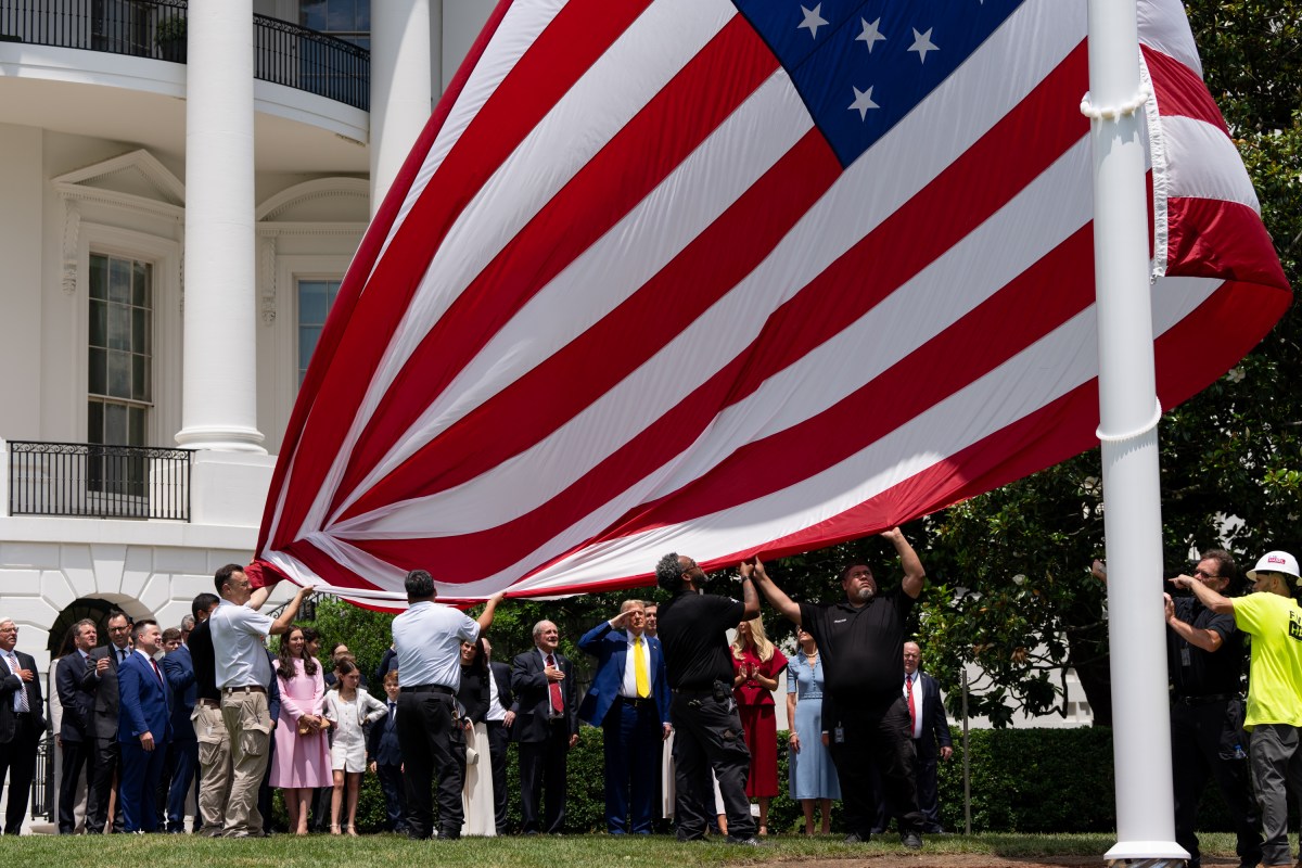 President Donald Trump watches the United States flag is raised on the newly installed flagpole on the South Lawn of the White House, Wednesday, June 18, 2025. (Official White House Photo by Andrea Hanks)