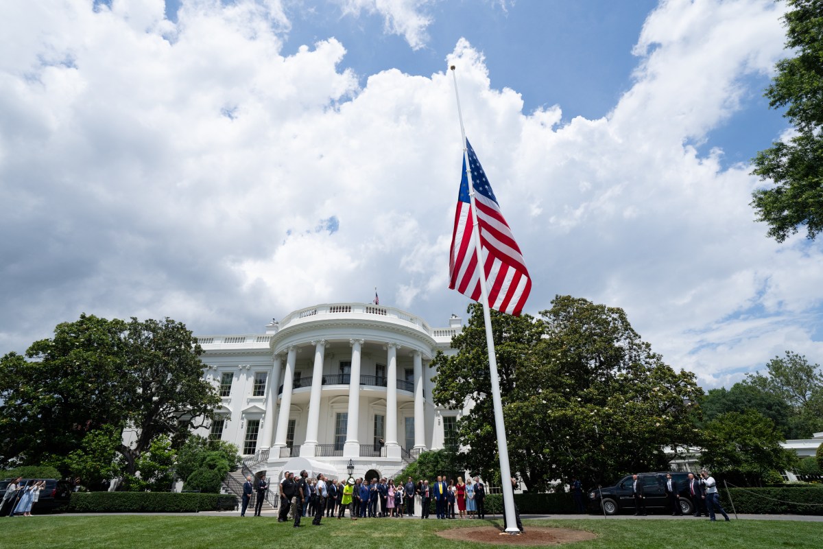 President Donald Trump watches the United States flag is raised on the newly installed flagpole on the South Lawn of the White House, Wednesday, June 18, 2025. (Official White House Photo by Andrea Hanks)