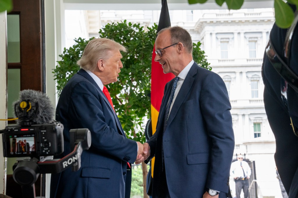 President Donald Trump greets German Chancellor Friedrich Merz at the West Wing entrance of the White House, Thursday, June 5, 2025. (Official White House Photo by Nick Choiniere)