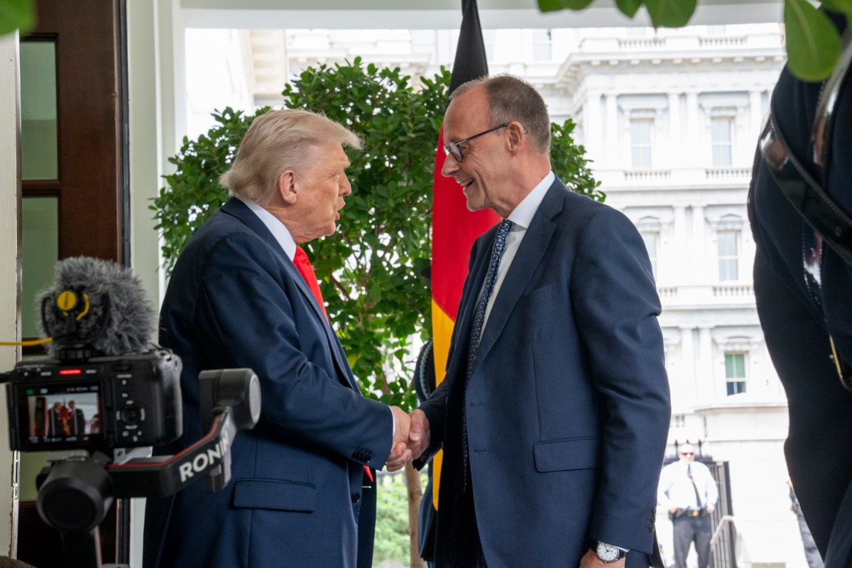 President Donald Trump greets German Chancellor Friedrich Merz at the West Wing entrance of the White House, Thursday, June 5, 2025. (Official White House Photo by Nick Choiniere)